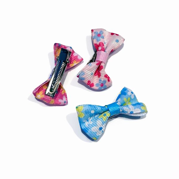 Hovedbilde 3pk blomstrede toppsløyfer med spenne